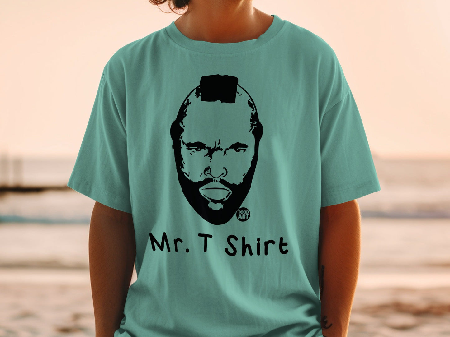 T-shirt with Mr. T's face and "Mr. T Shirt 100% ART" text.