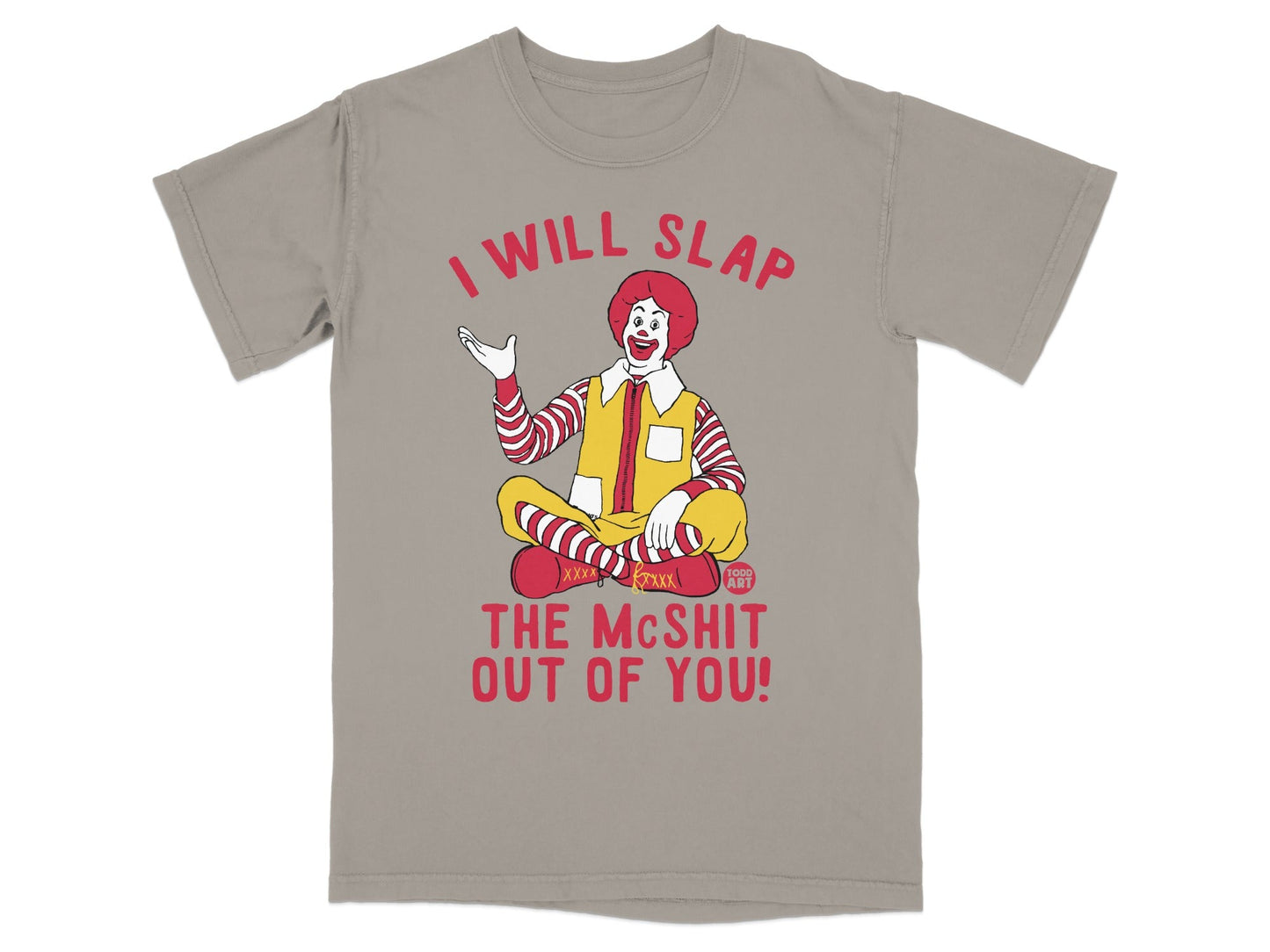 Ronald McDonald in traditional outfit sitting and gesturing with text "I WILL SLAP THE MCSHIT OUT OF YOU".