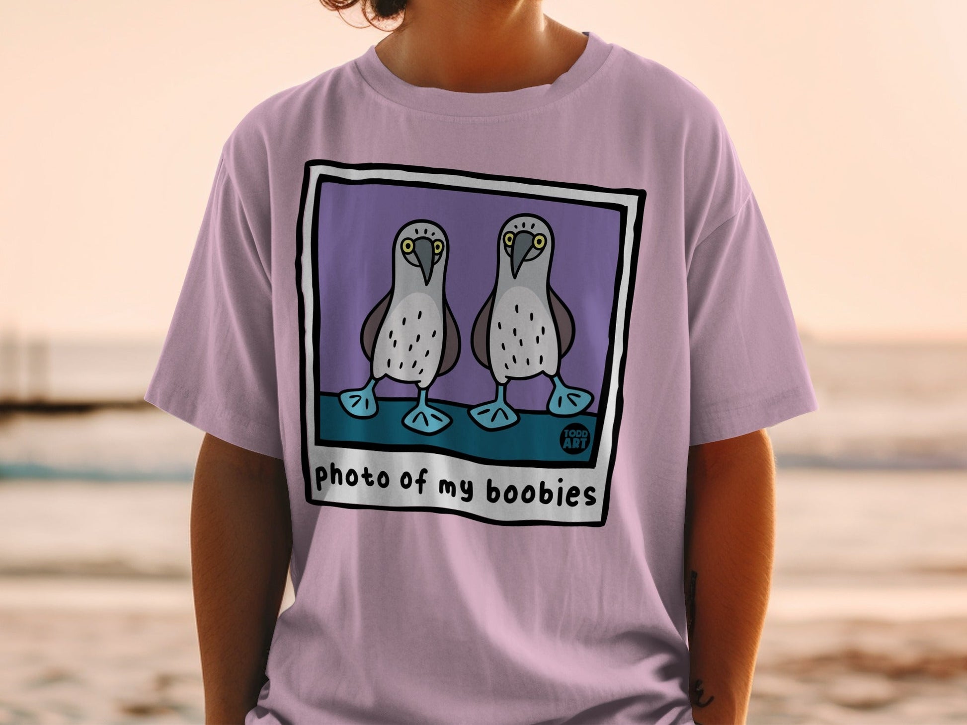 T-shirt with cartoon boobies and text "photo of my boobies".