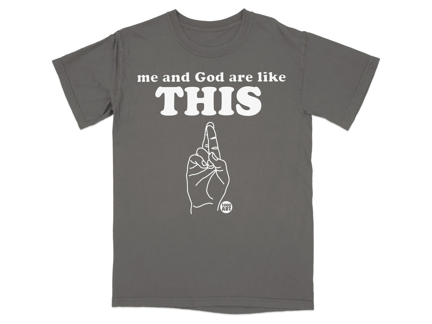 Dark gray t-shirt with "me and God are like THIS" and raised index finger design.