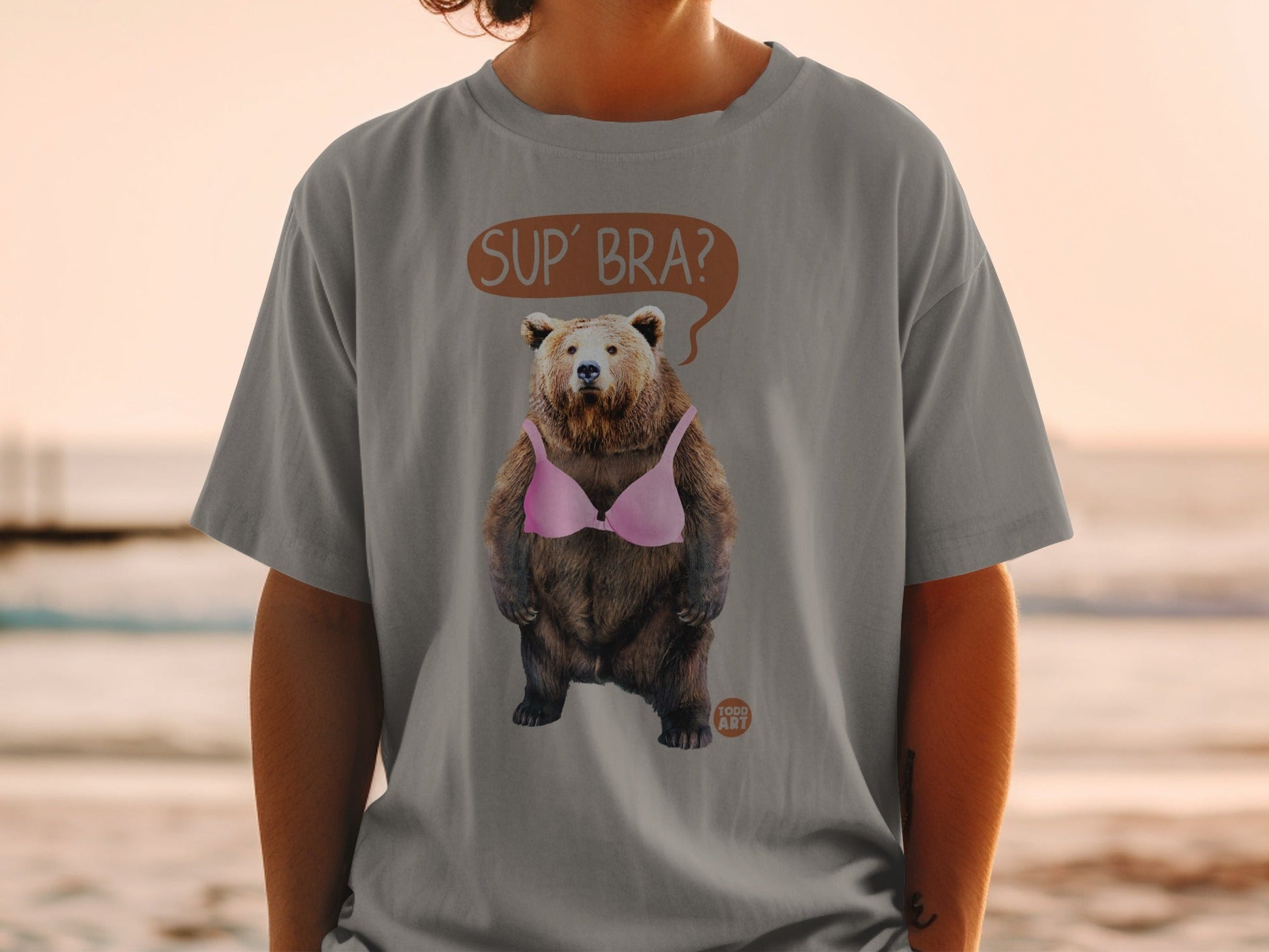 Humorous 'Sup' Bra' Bear in Pink Bra Graphic T-shirt