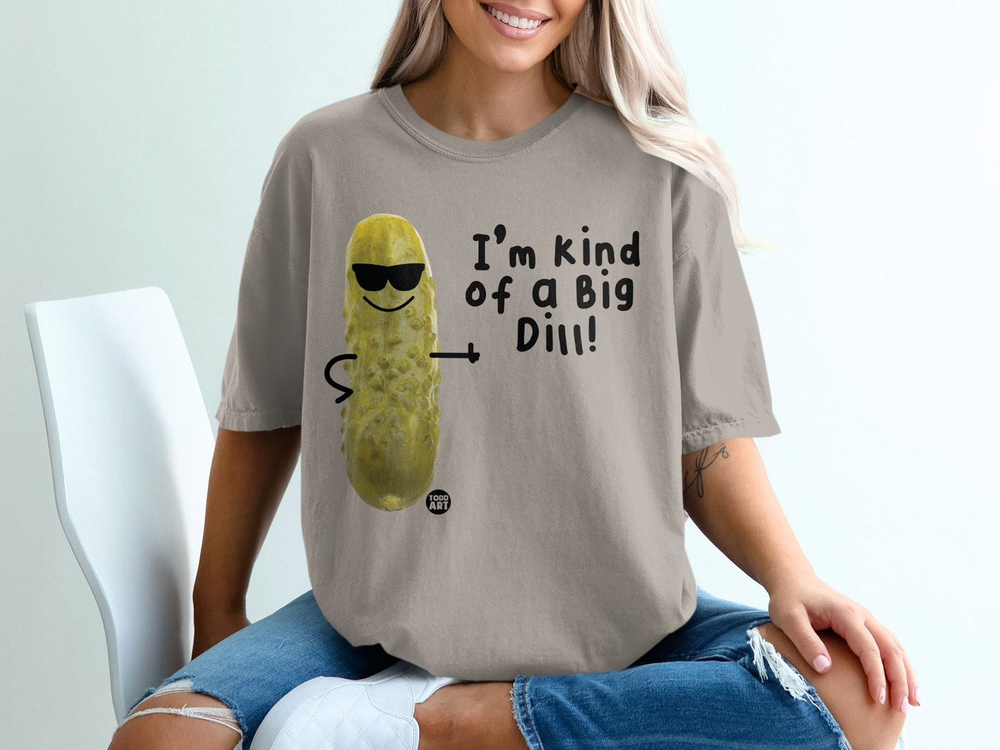 T-shirt with cartoon pickle wearing sunglasses, saying "I'm kind of a big dill!".