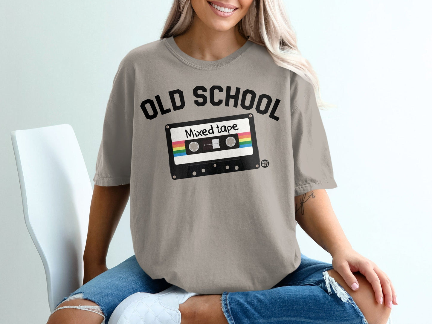 T-shirt with "OLD SCHOOL" and cassette tape graphic.