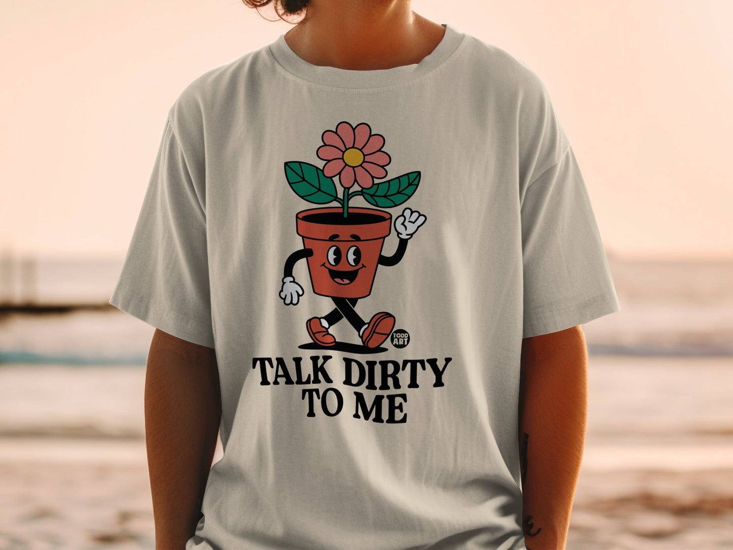 T-shirt with cartoon flower pot character saying "Talk Dirty To Me".