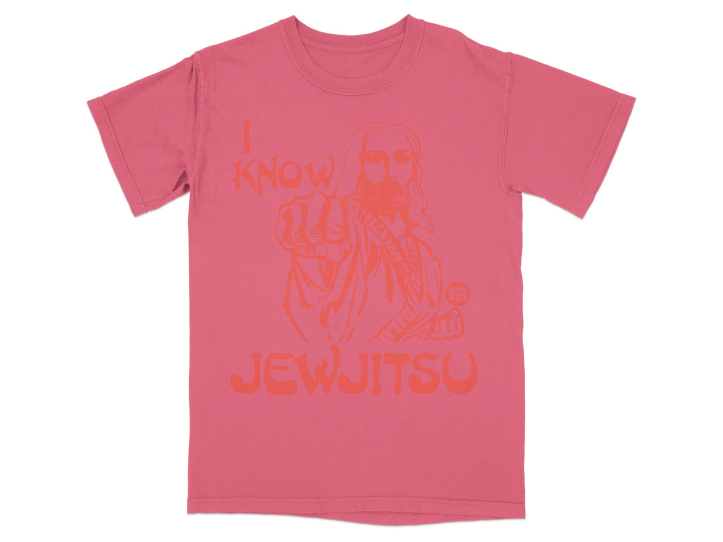 Pink t-shirt with orange graphic of Jesus pointing and text "I KNOW JEWJITSU".