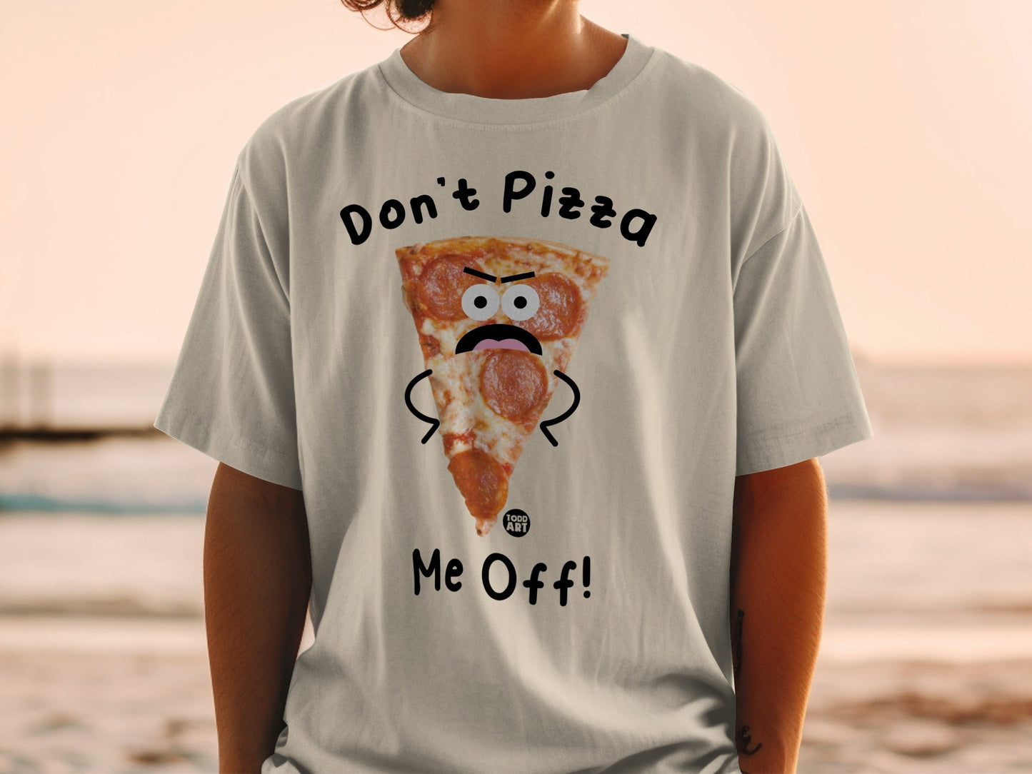 T-shirt with a cartoon pizza slice wearing a mustache and the text "Don't Pizza Me Off!".