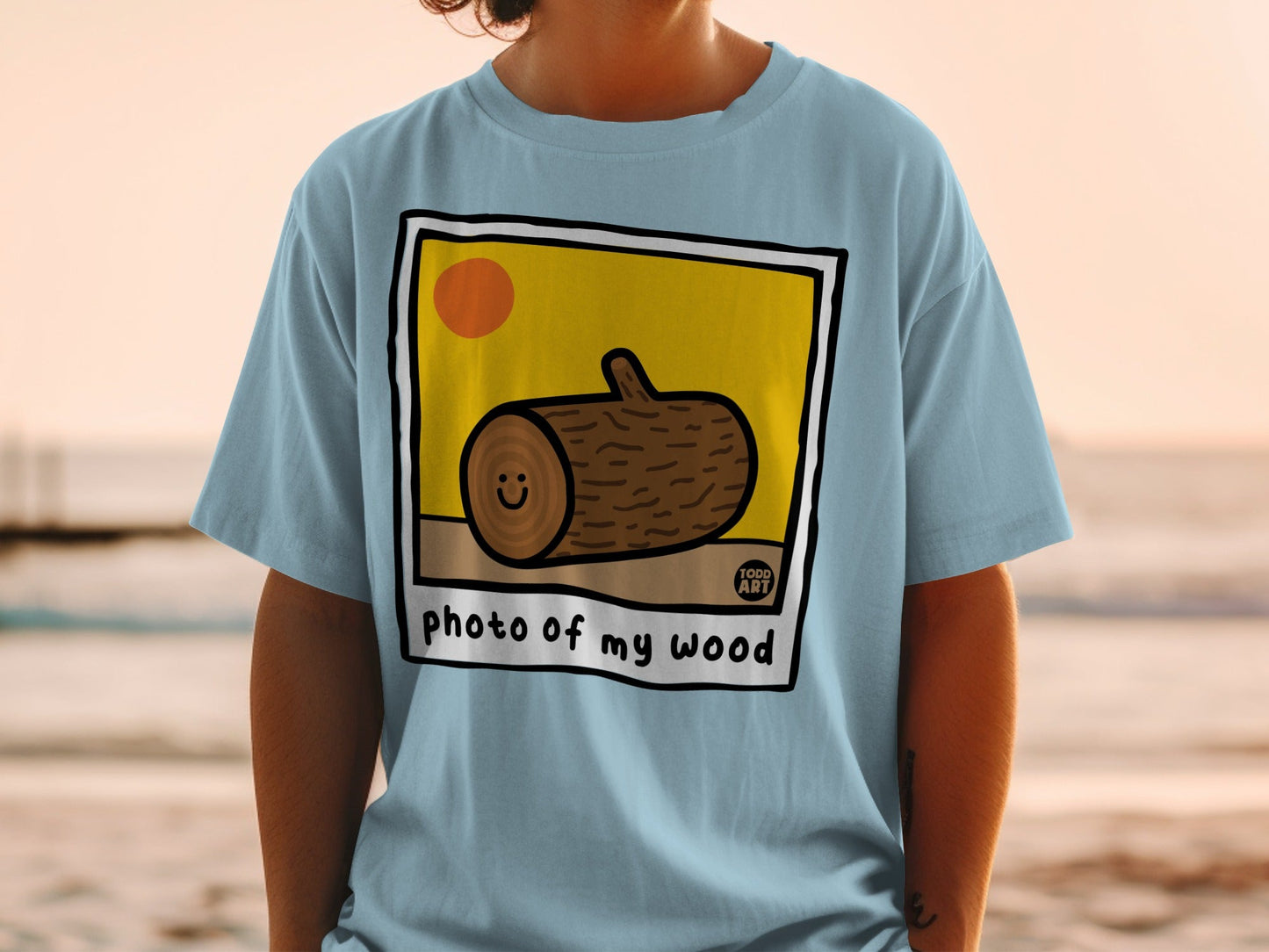T-shirt with a cartoon log and the text "photo of my wood."