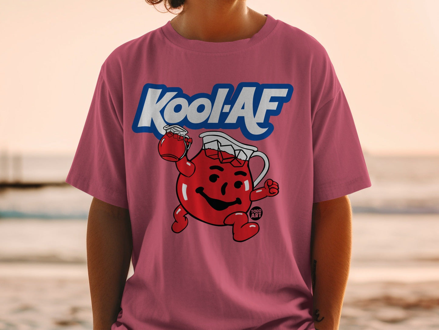 Pink t-shirt with Kool-Aid Man character and "Kool-AF" text.