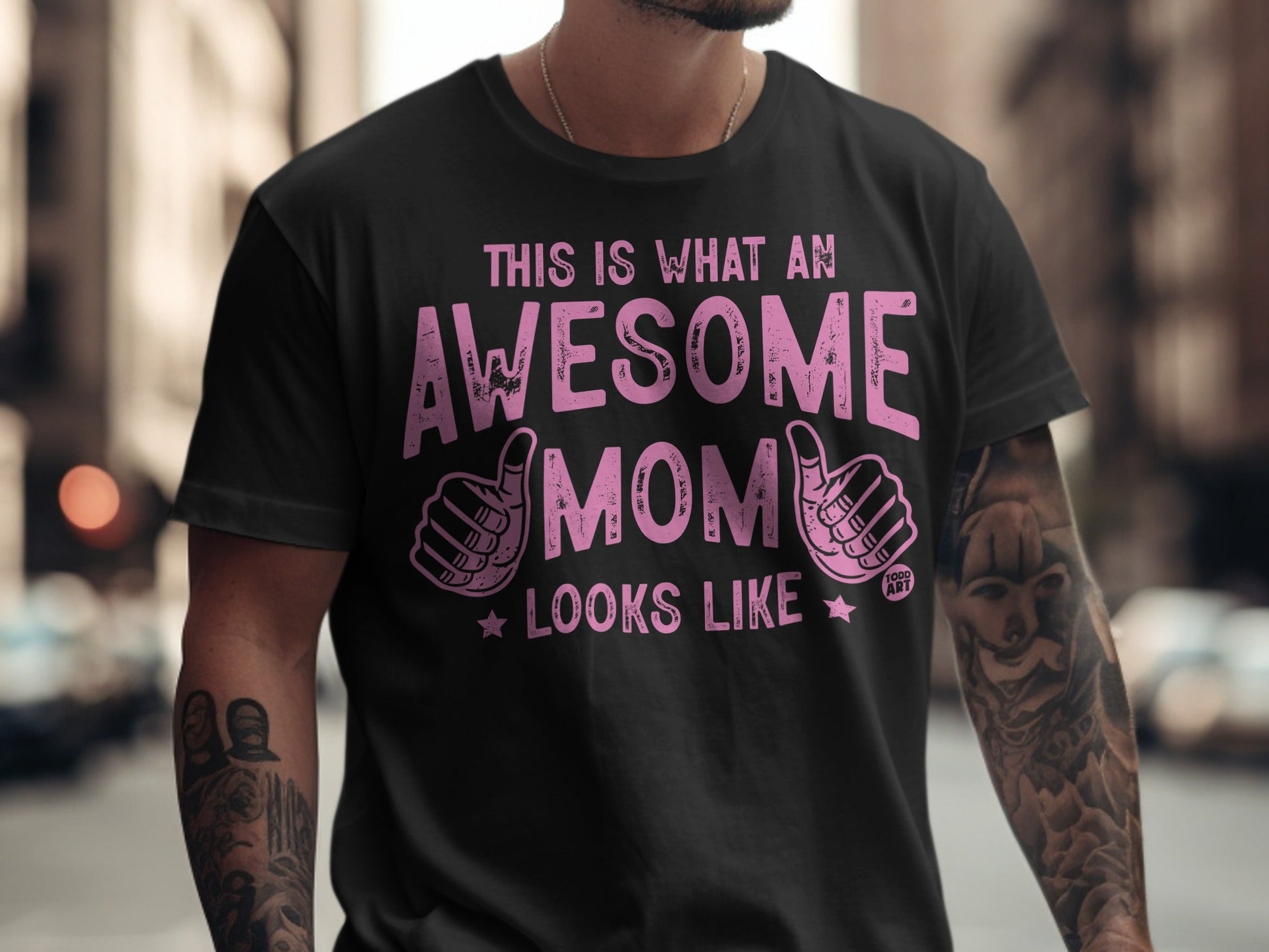 Awesome Mom graphic tee with thumbs up and stars.