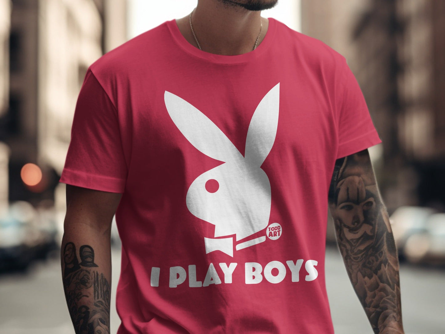 Red t-shirt with white Playboy bunny logo and "I PLAY BOYS" text.