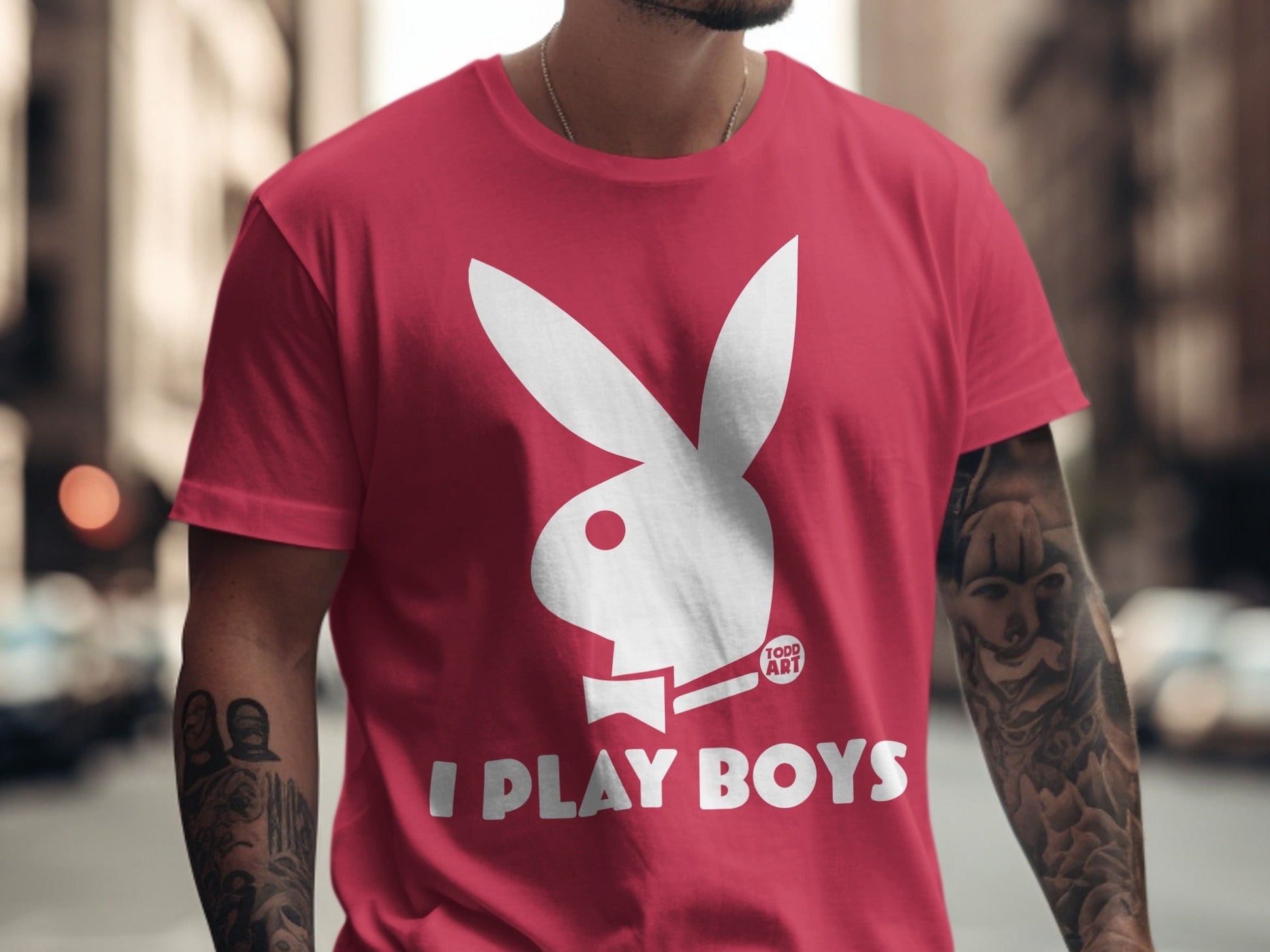 Red t-shirt with white Playboy bunny logo and "I PLAY BOYS" text.