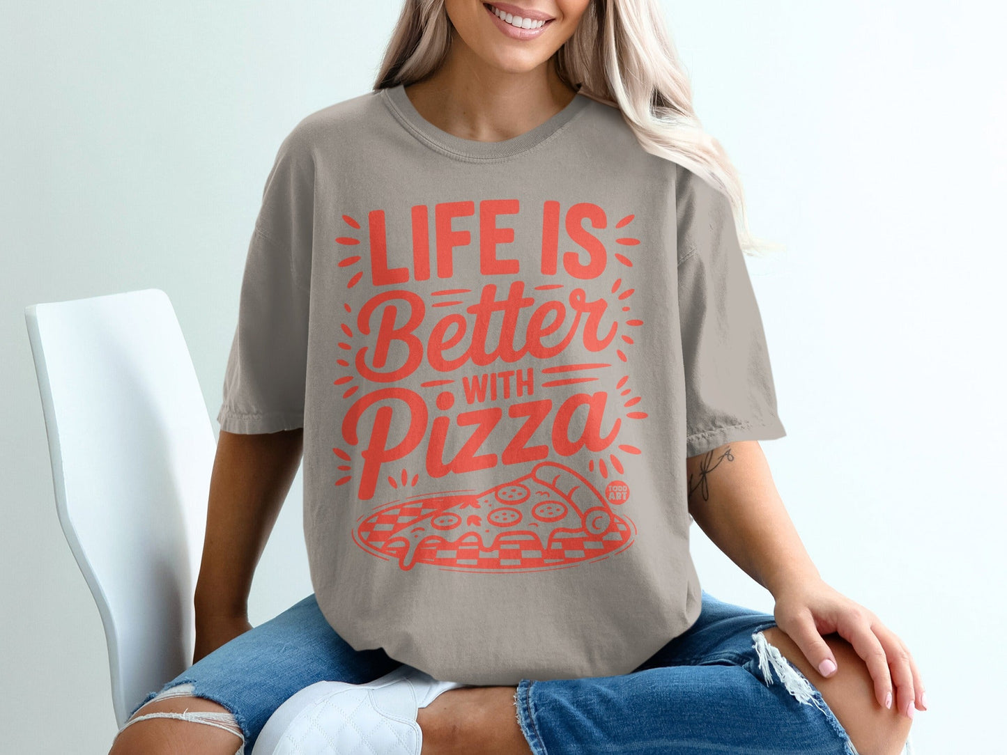 "Life is Better with Pizza" graphic t-shirt on a model.