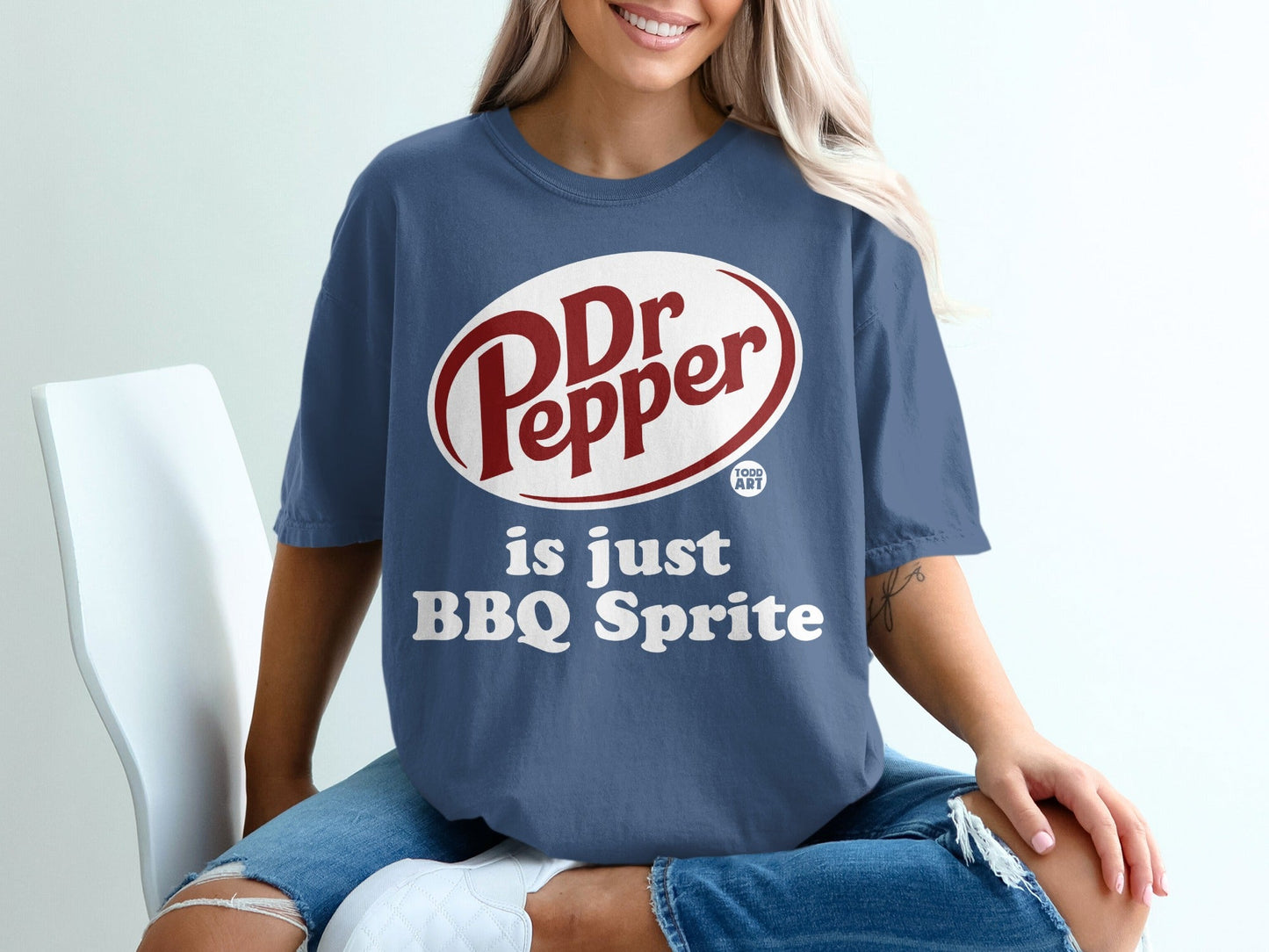 Blue t-shirt with Dr Pepper logo and "is just BBQ Sprite" text.