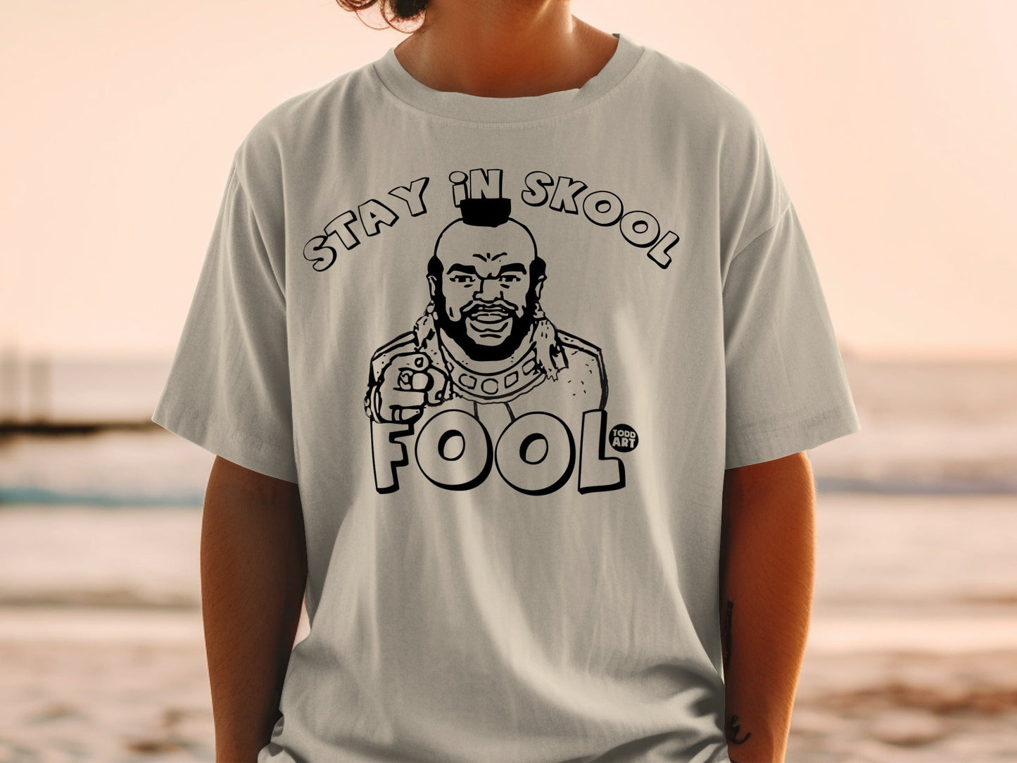T-shirt with Mr. T graphic and text "STAY IN SKOOL FOOL".