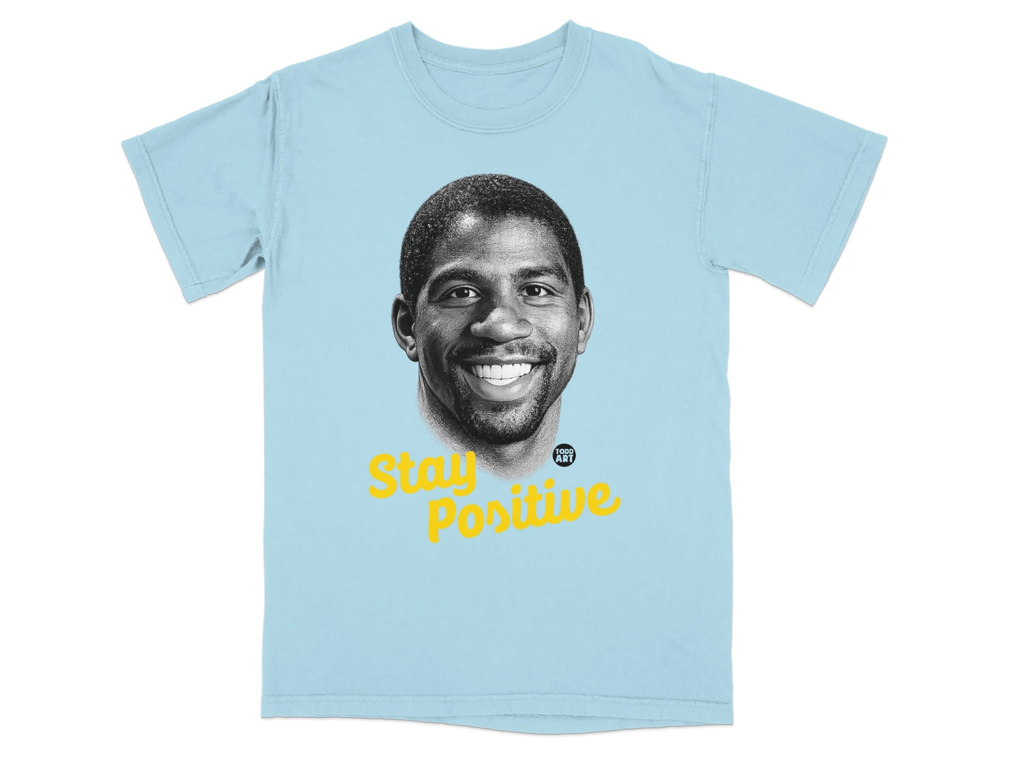 Light blue t-shirt with Magic Johnson's portrait and "Stay Positive" text.