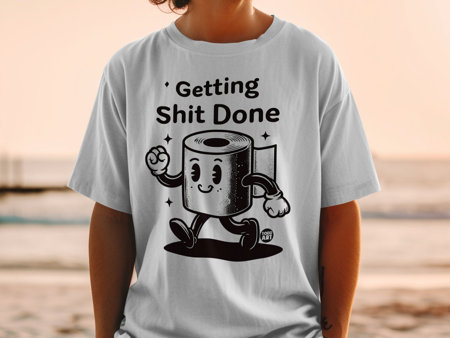 T-shirt with cartoon toilet paper character and text "Getting Shit Done".