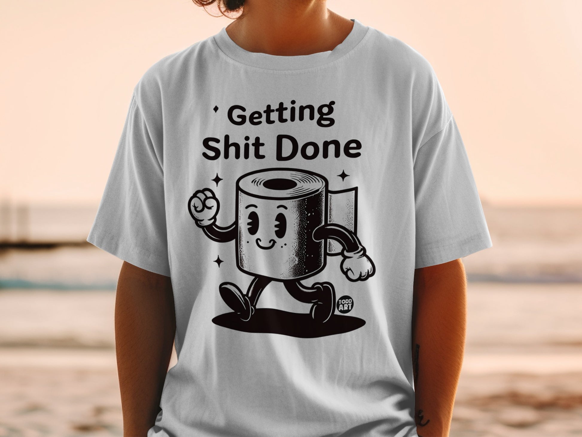 T-shirt with cartoon toilet paper character and text "Getting Shit Done".