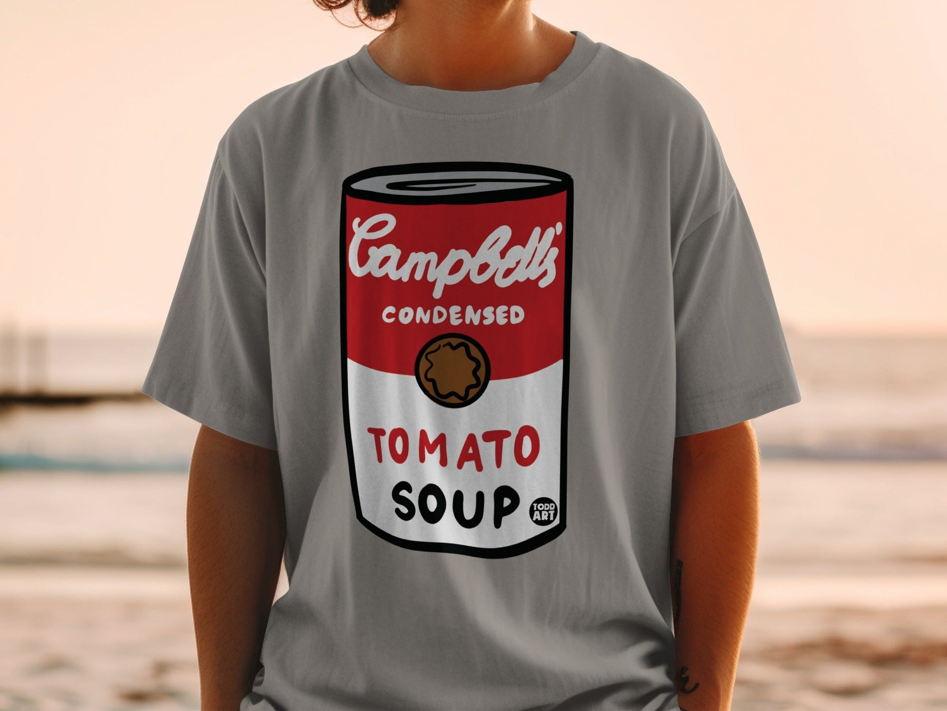 Grey t-shirt featuring a Campbell's Condensed Tomato Soup can design.