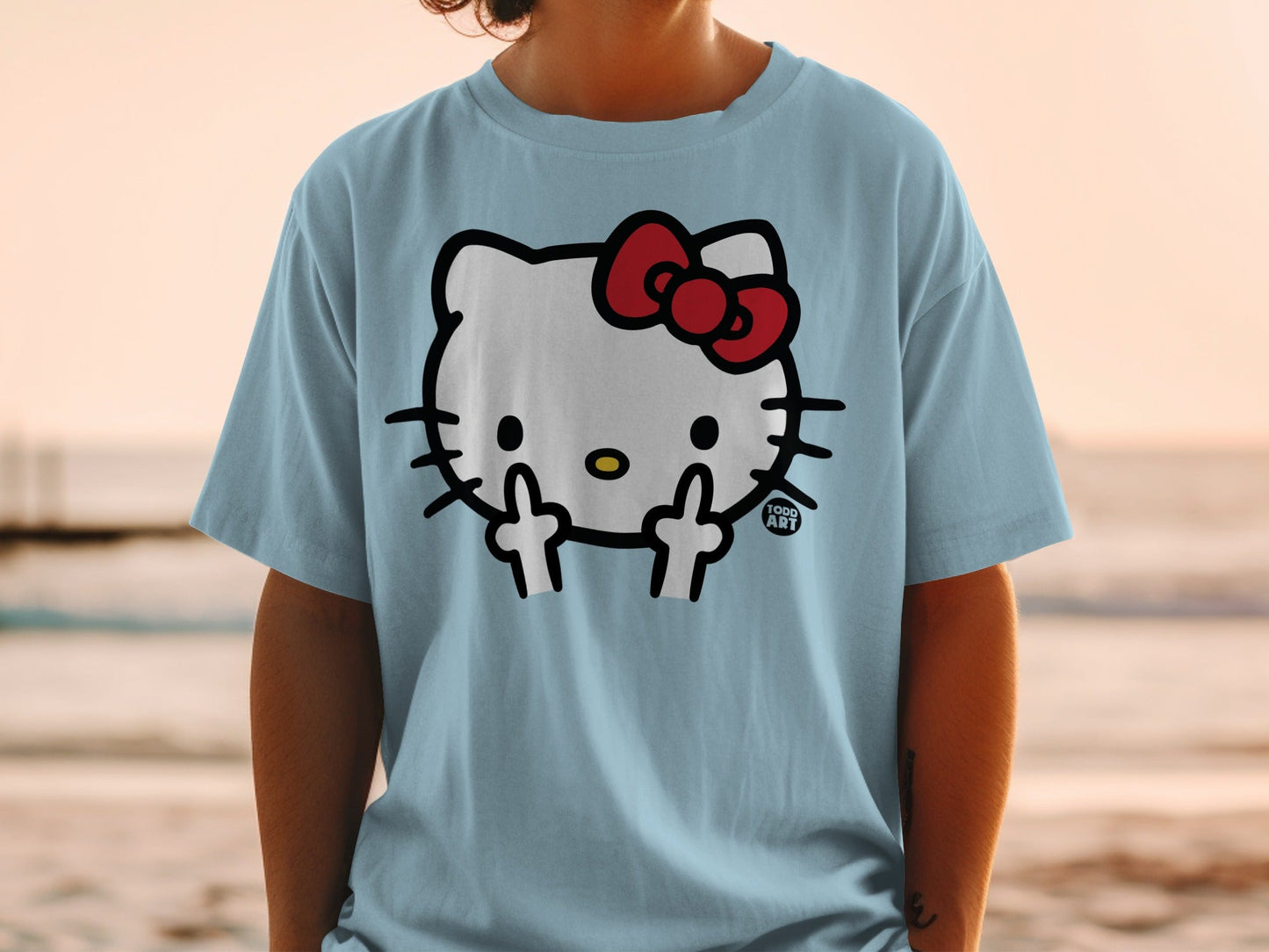 Light blue t-shirt with Hello Kitty giving the middle finger.