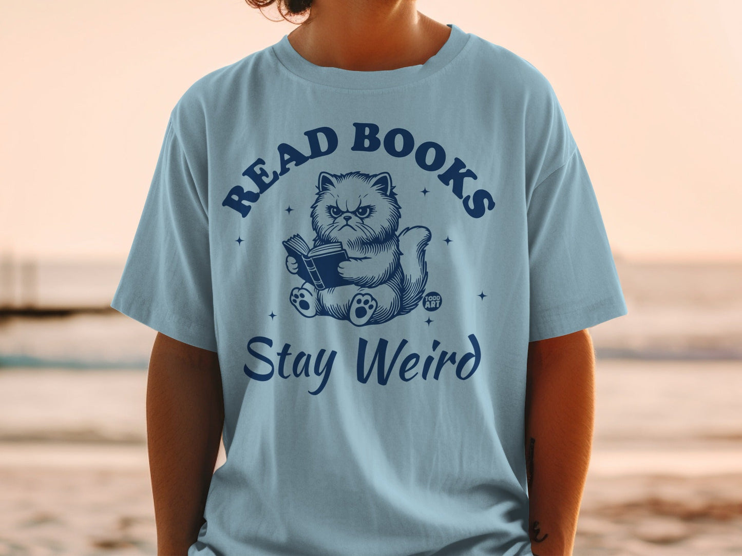 Read Books Stay Weird Cat Graphic Tee Product