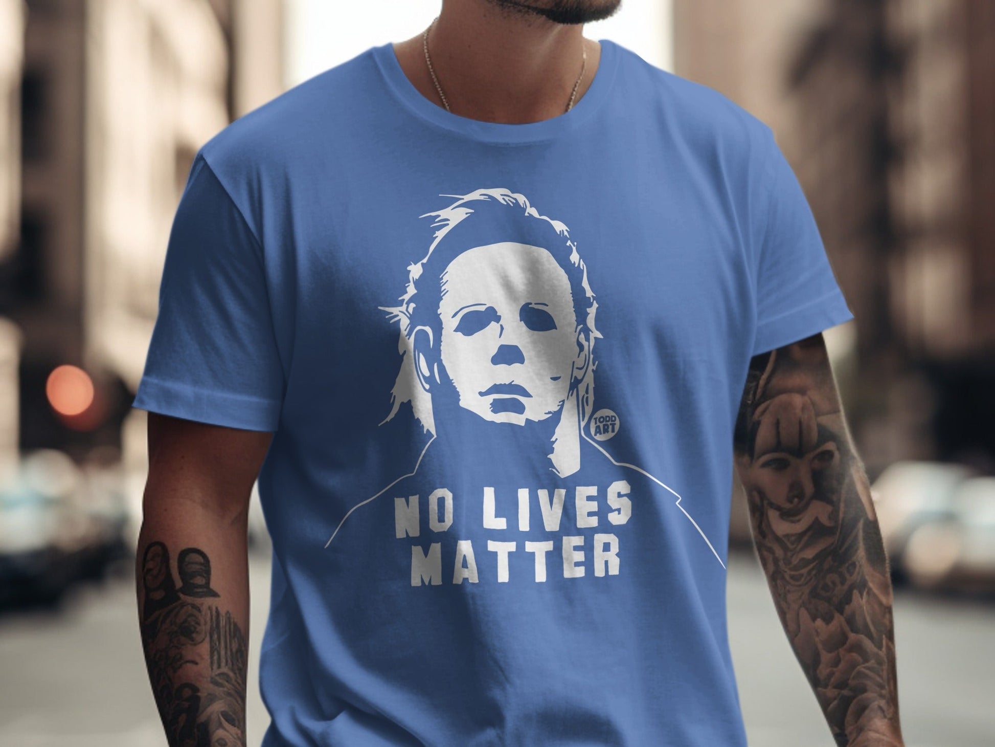 Blue t-shirt with white graphic of Michael Myers and text "NO LIVES MATTER".