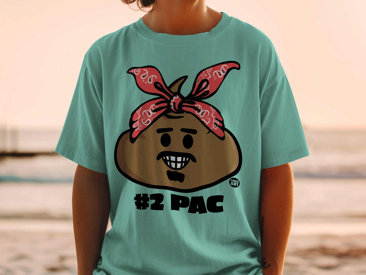 Turquoise t-shirt with a cartoon poop character wearing a red bandana and the text "#2 PAC".