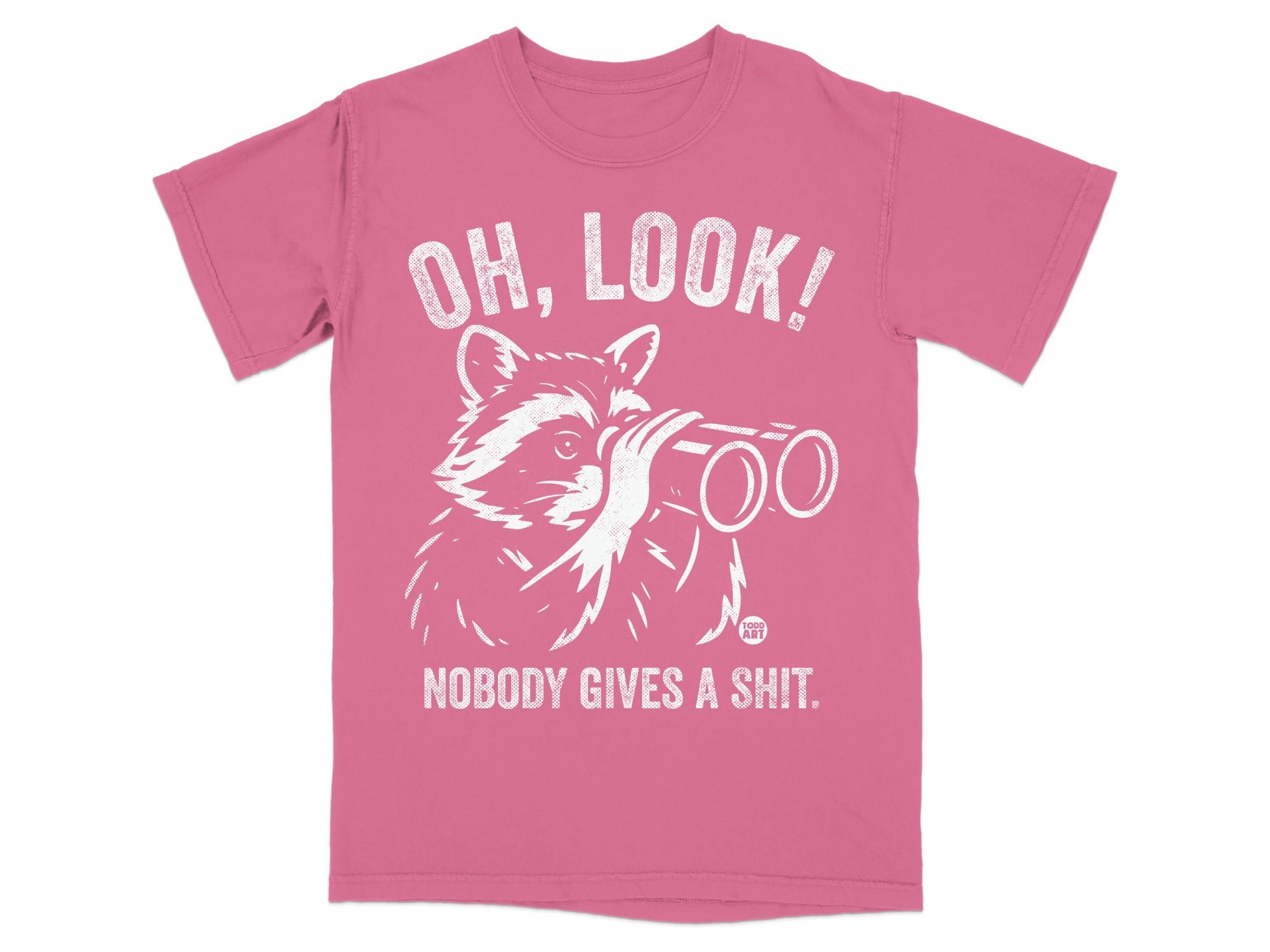 Pink t-shirt with a raccoon looking through binoculars and text "OH, LOOK! NOBODY GIVES A SHIT."