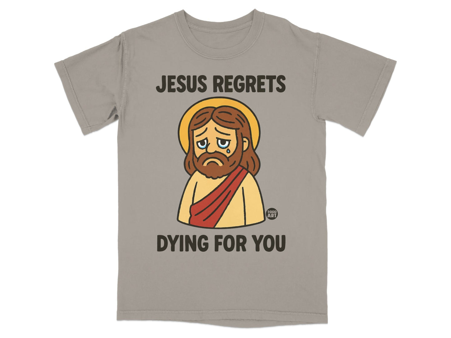 Grey t-shirt with cartoon Jesus saying "Jesus regrets dying for you".
