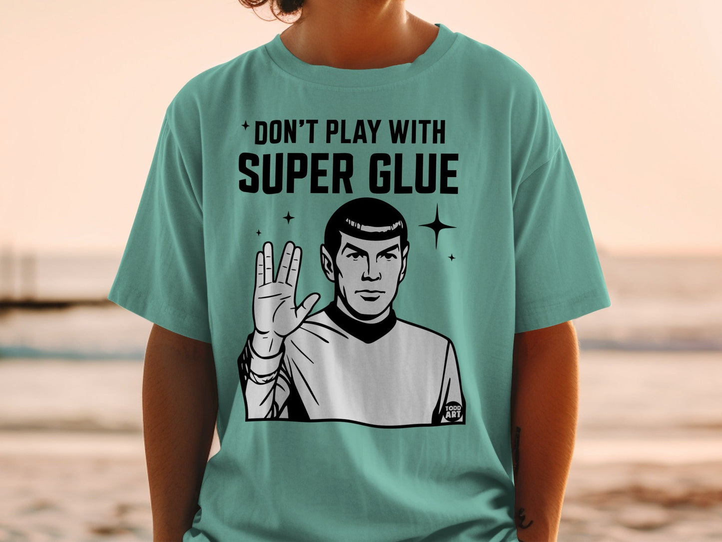 Spock from Star Trek giving the Vulcan salute on a t-shirt.