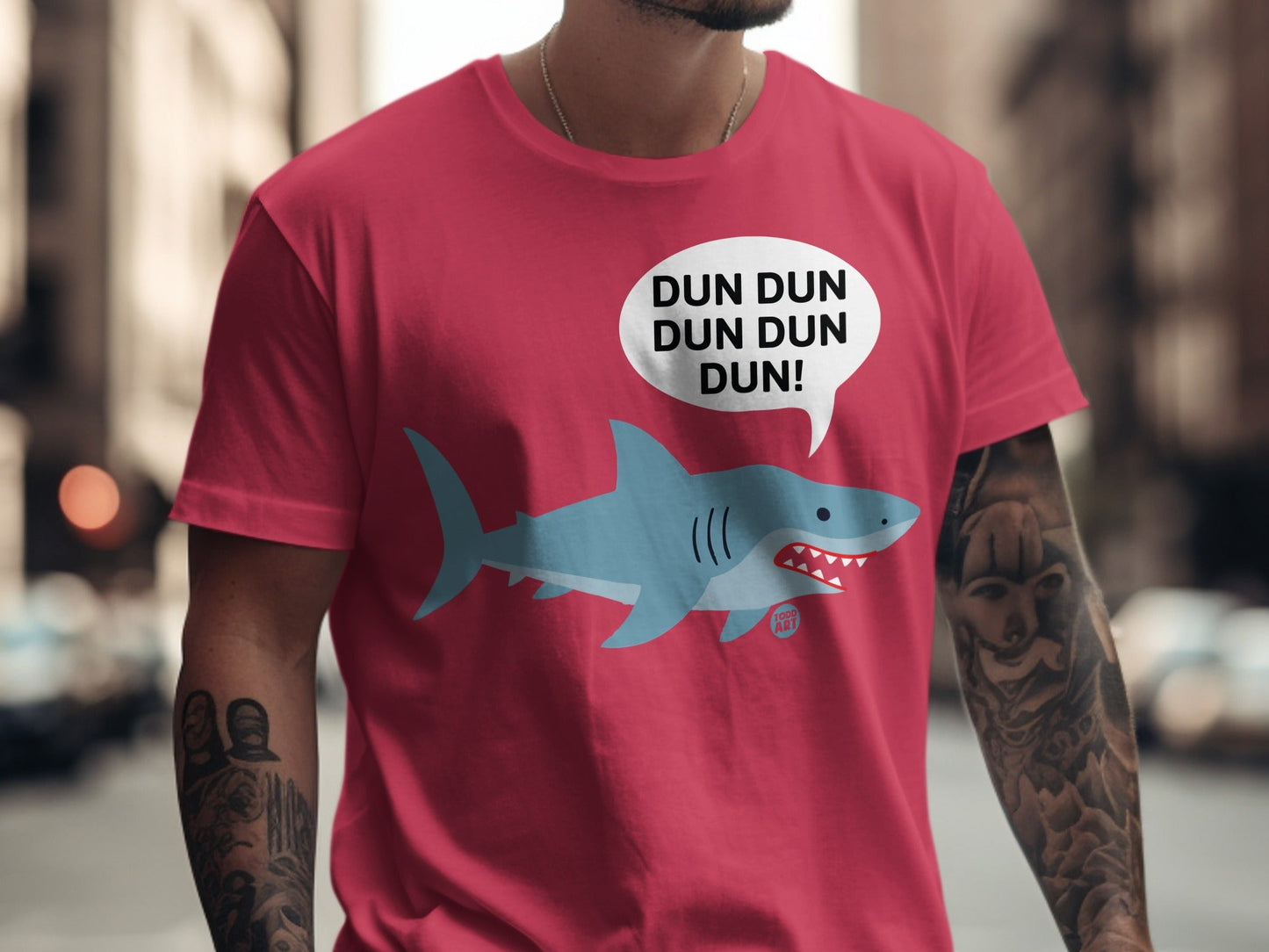 Shark graphic with text "DUN DUN DUN DUN!" on a t-shirt.