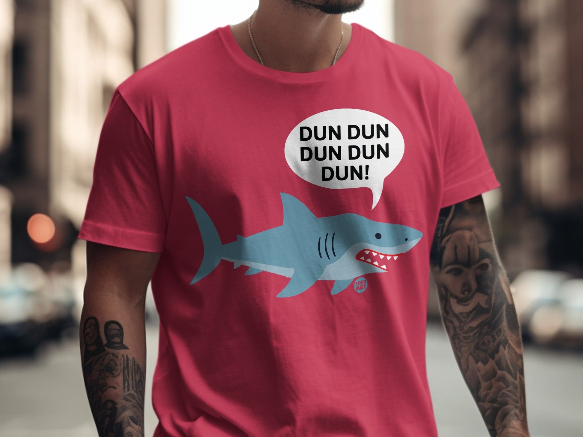 Shark graphic with text "DUN DUN DUN DUN!" on a t-shirt.