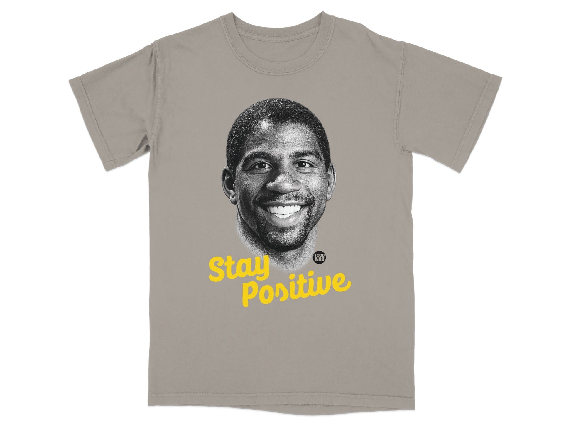 Gray t-shirt with Magic Johnson portrait and "Stay Positive" text.