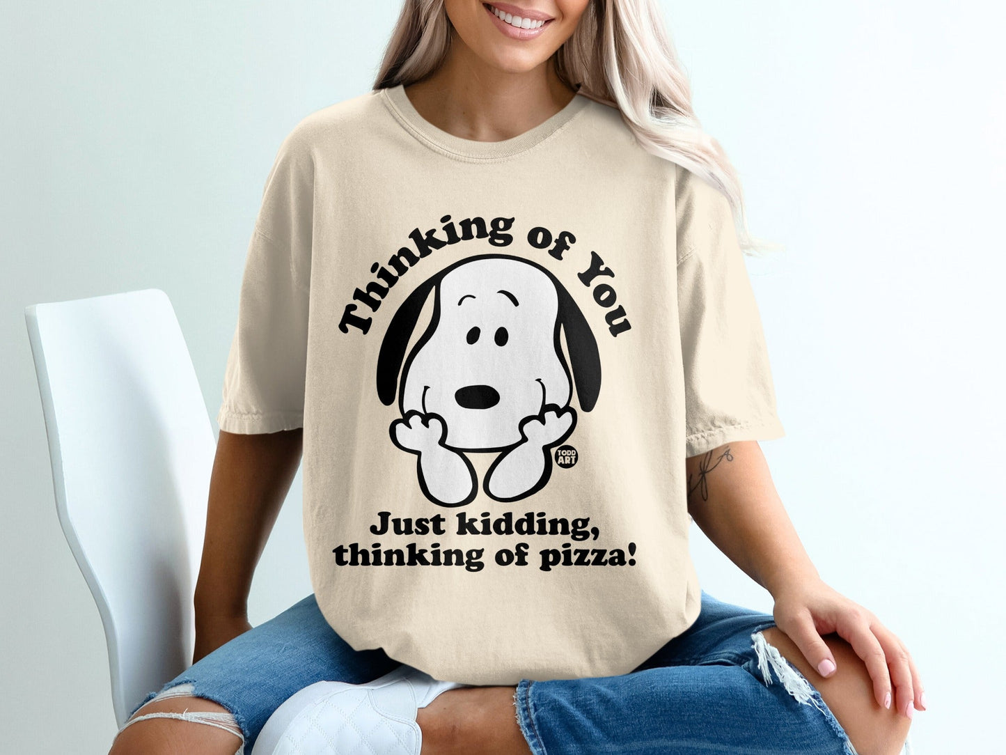 Snoopy shirt with text "Thinking of you. Just kidding, thinking of pizza!"