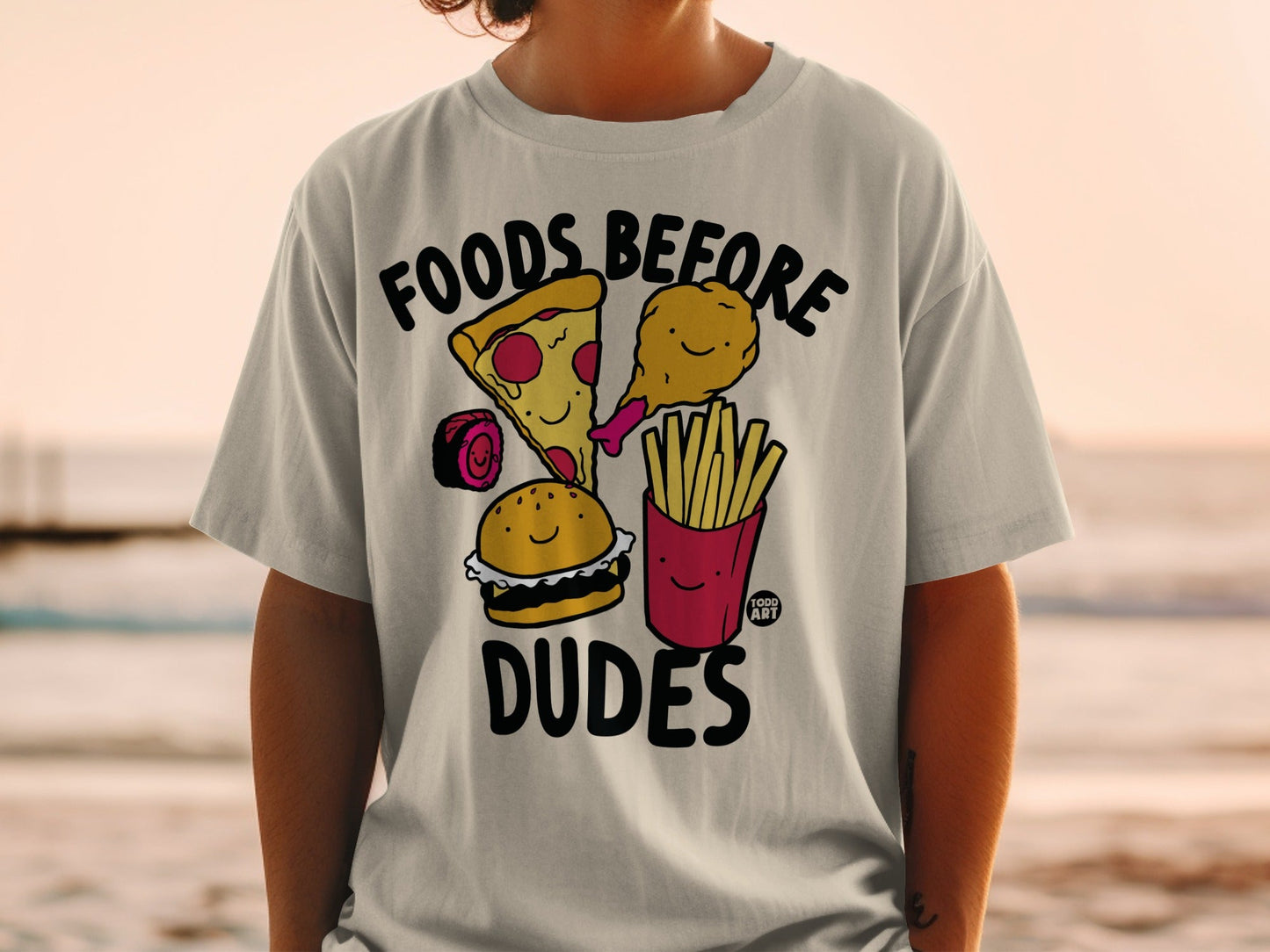 T-shirt with cartoon fast food: pizza, burger, fries, and chicken.