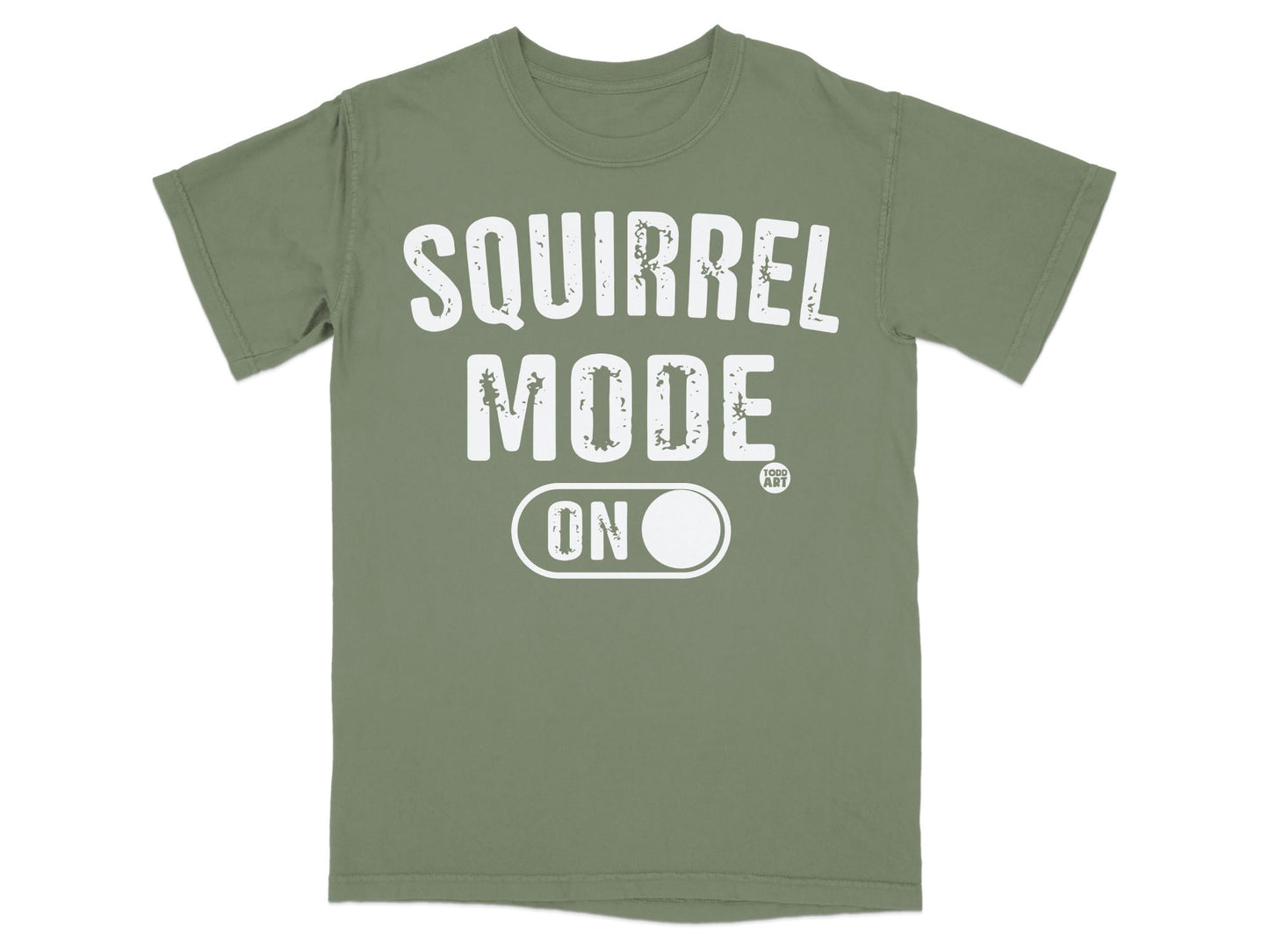 Green t-shirt with "SQUIRREL MODE ON" graphic.