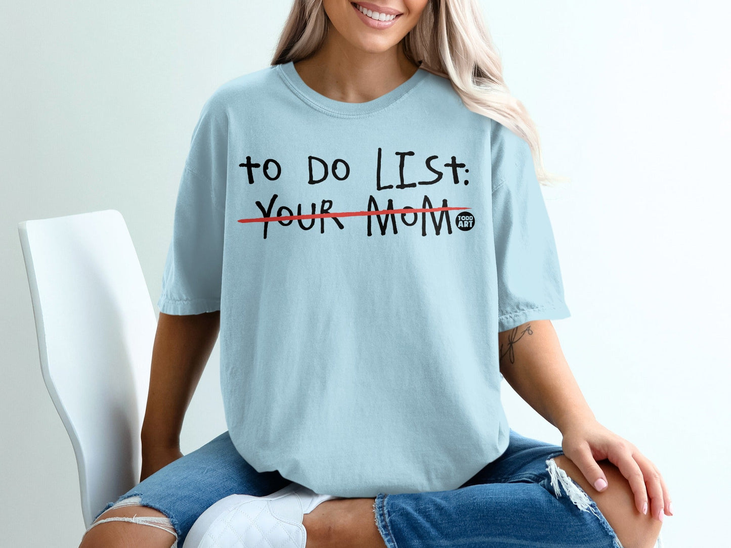 Light blue t-shirt with "TO DO LIST: YOUR MOM" printed in red text.