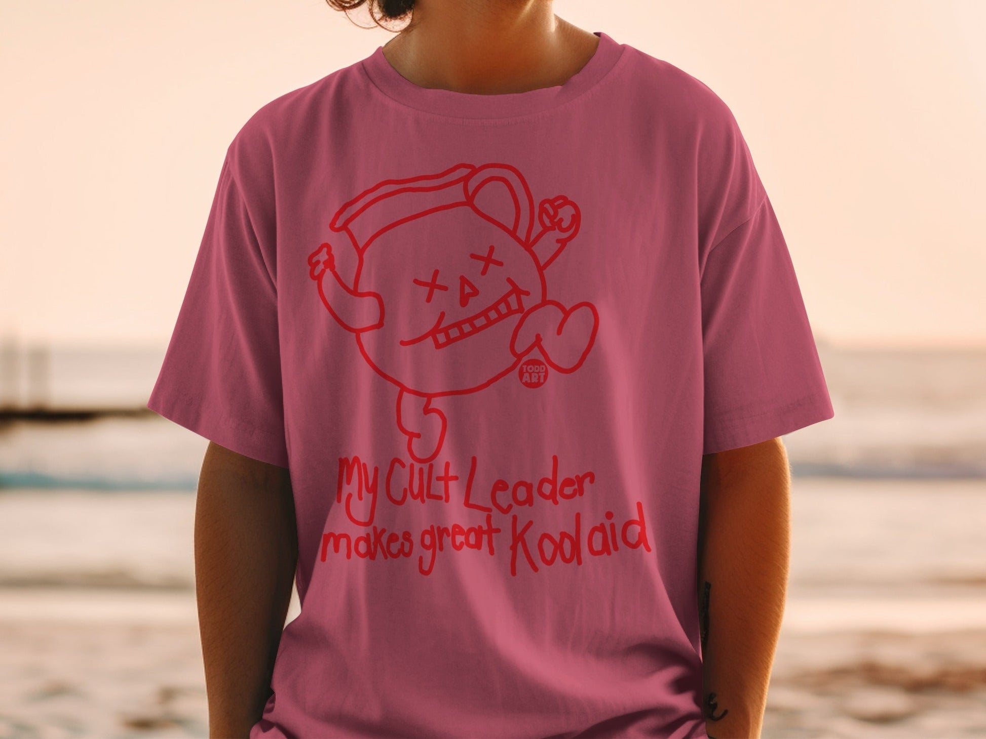 T-shirt with Kool-Aid Man character and "My Cult Leader Makes Great Koolaid" text.