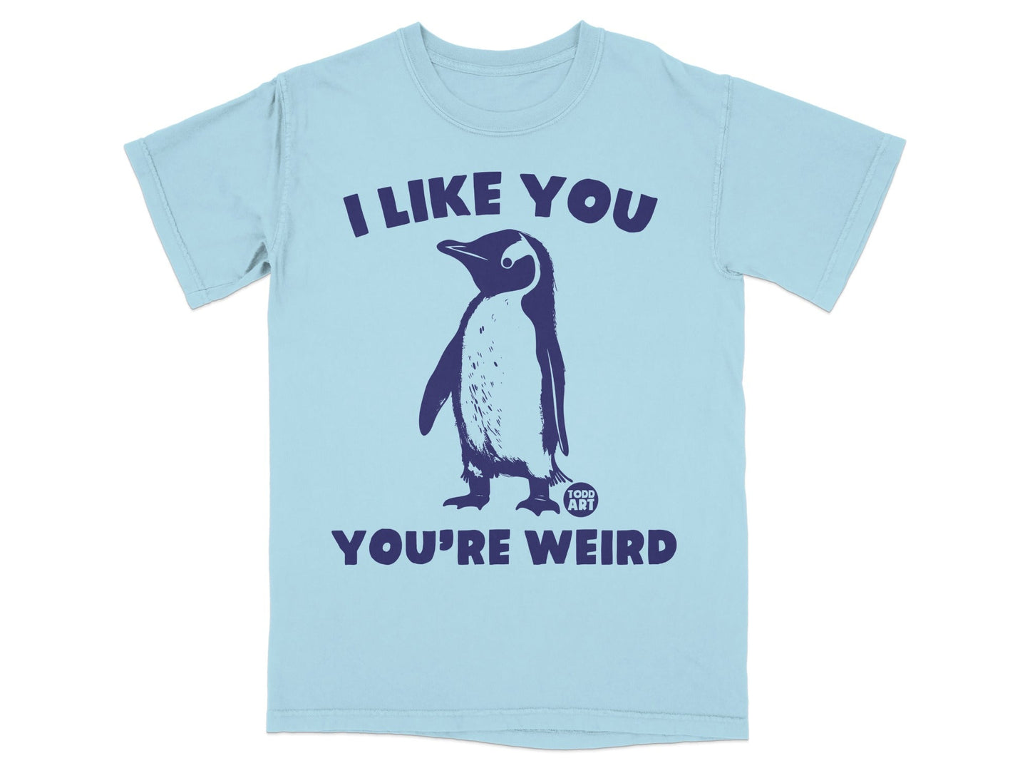 Light blue t-shirt with a penguin and text that reads "I LIKE YOU YOU'RE WEIRD TODD ART".