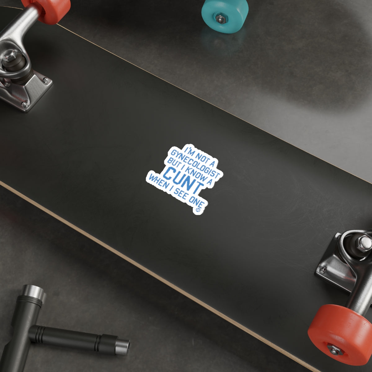 Black Skateboard with Funny Blue White Sticker Design
