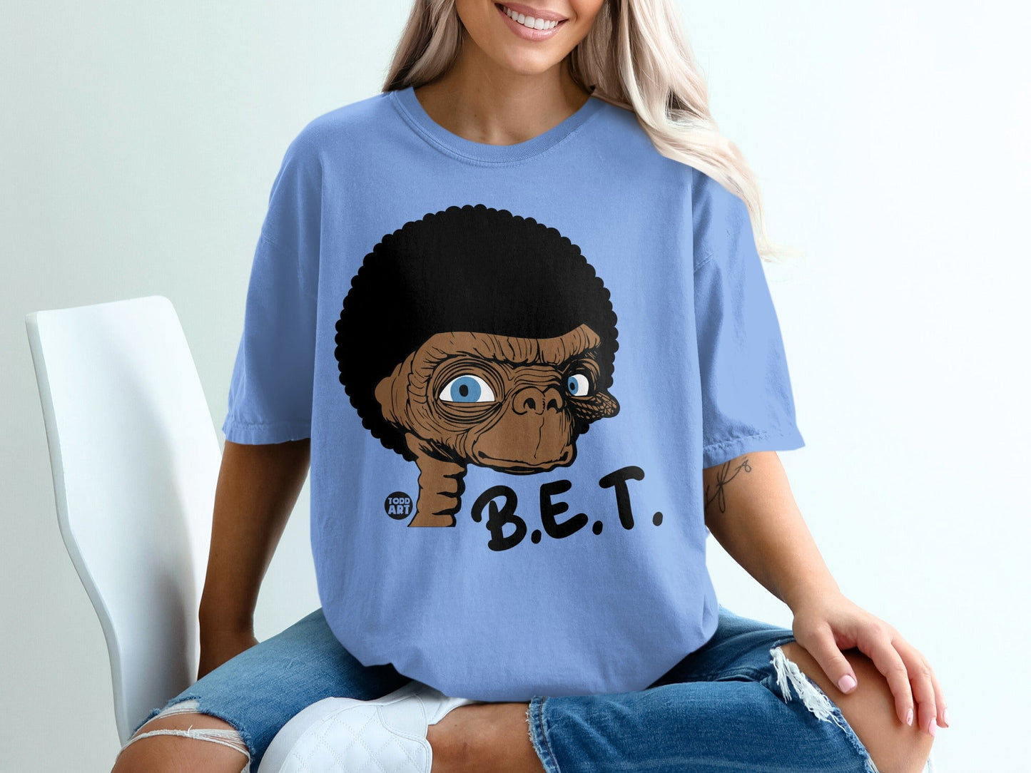 Blue t-shirt with cartoon E.T. and text B.E.T.