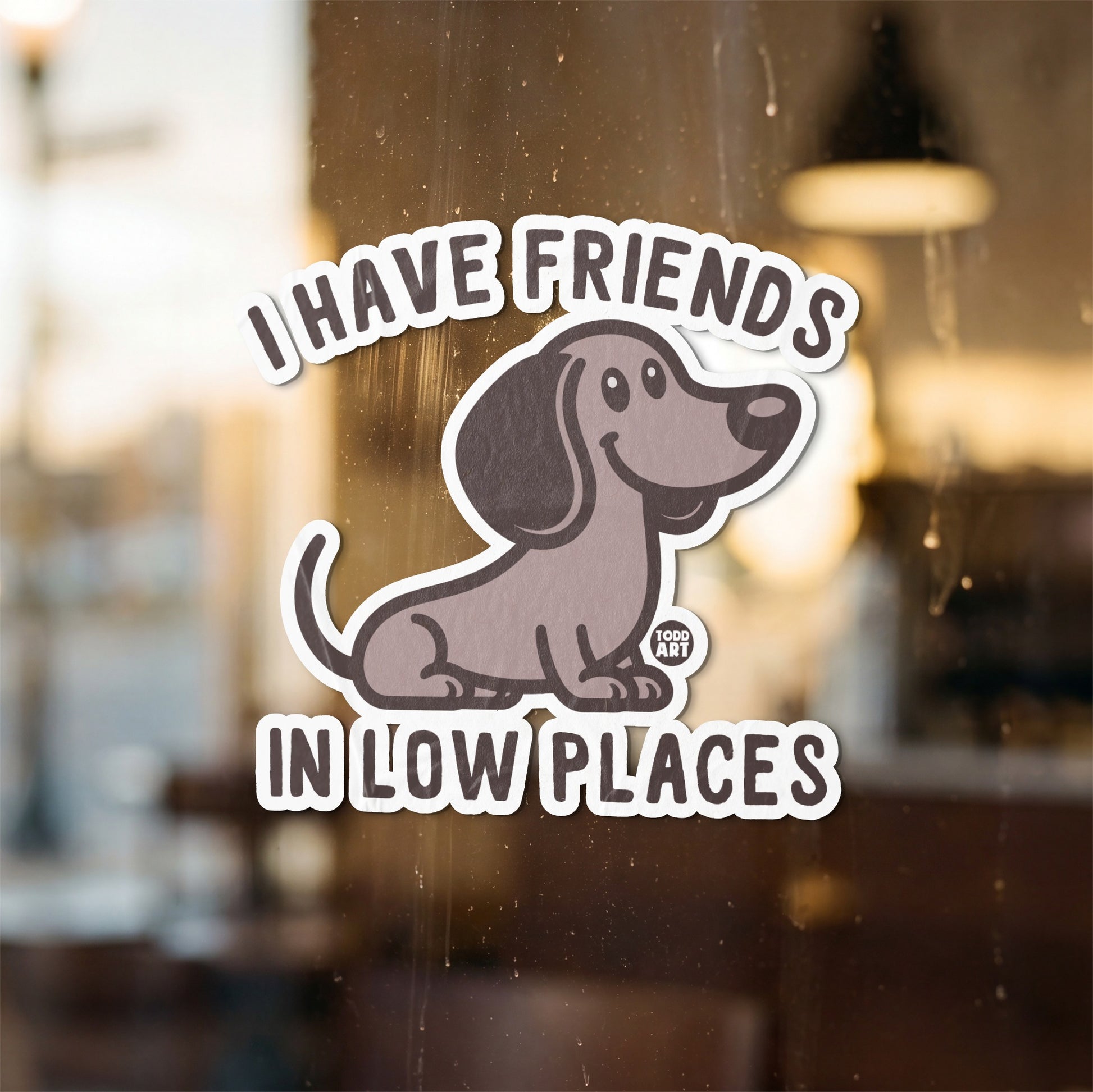 Dachshund sticker reads "I HAVE FRIENDS IN LOW PLACES"