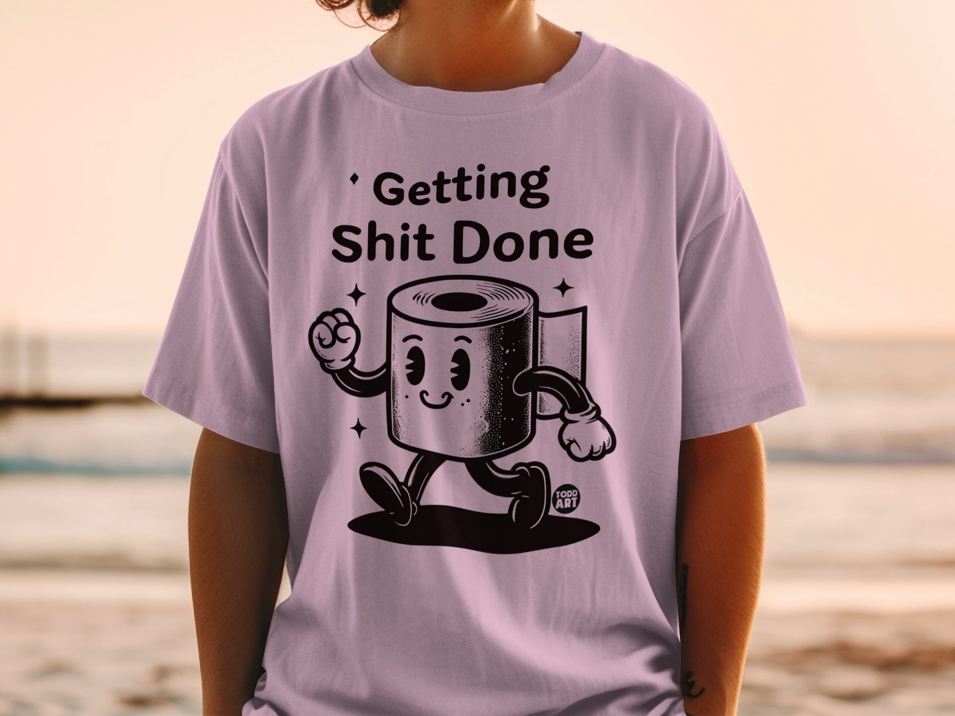 T-shirt with toilet paper character saying "Getting Shit Done".