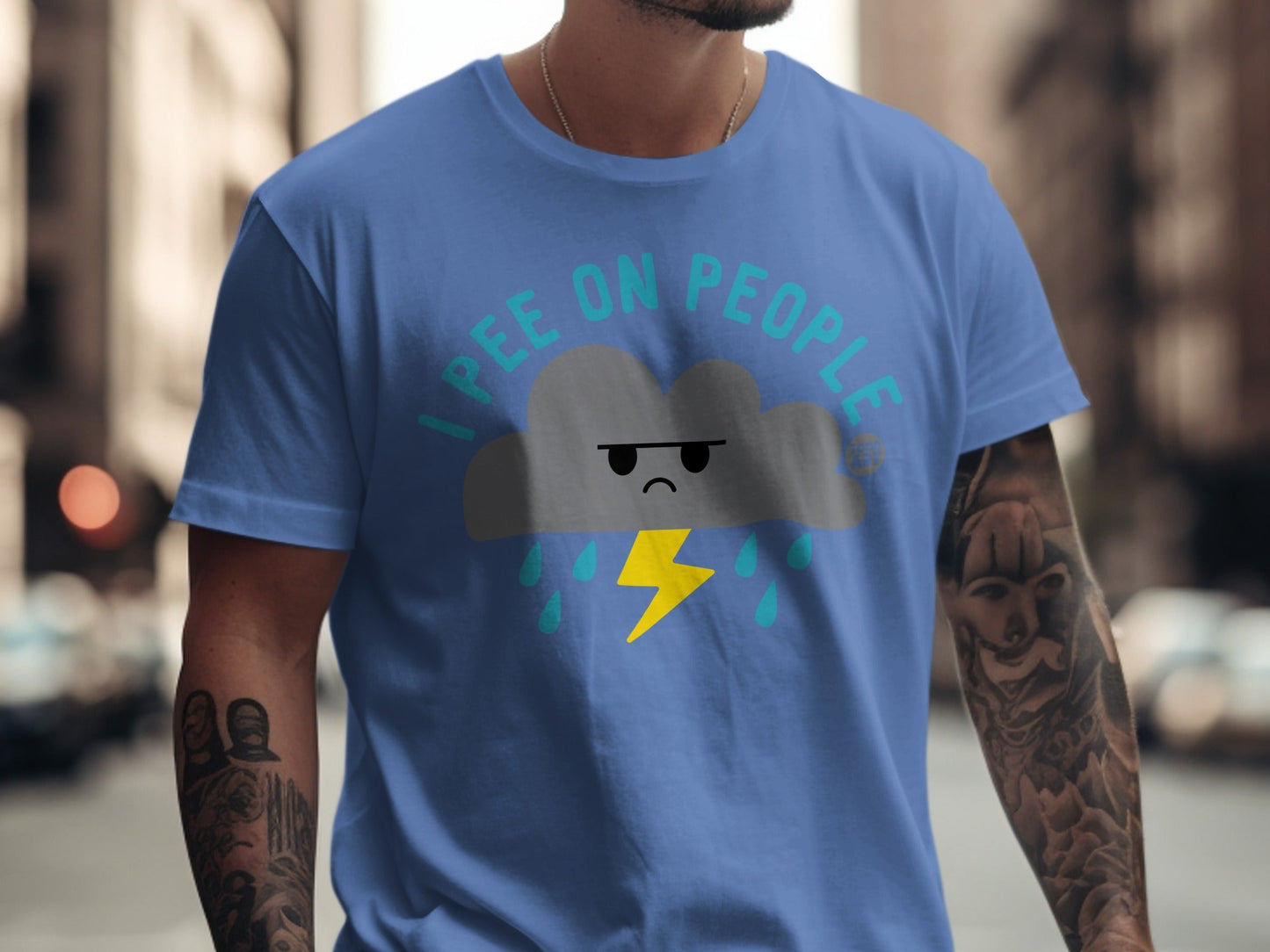 Blue t-shirt with a grumpy cloud, lightning bolt, and "I PEE ON PEOPLE" text.
