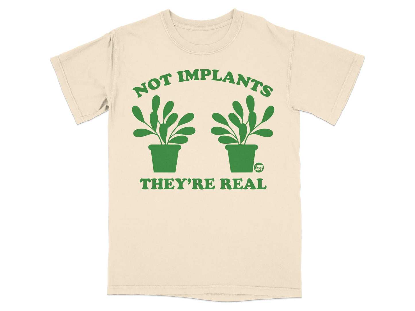Cream t-shirt with green text and two potted plants.