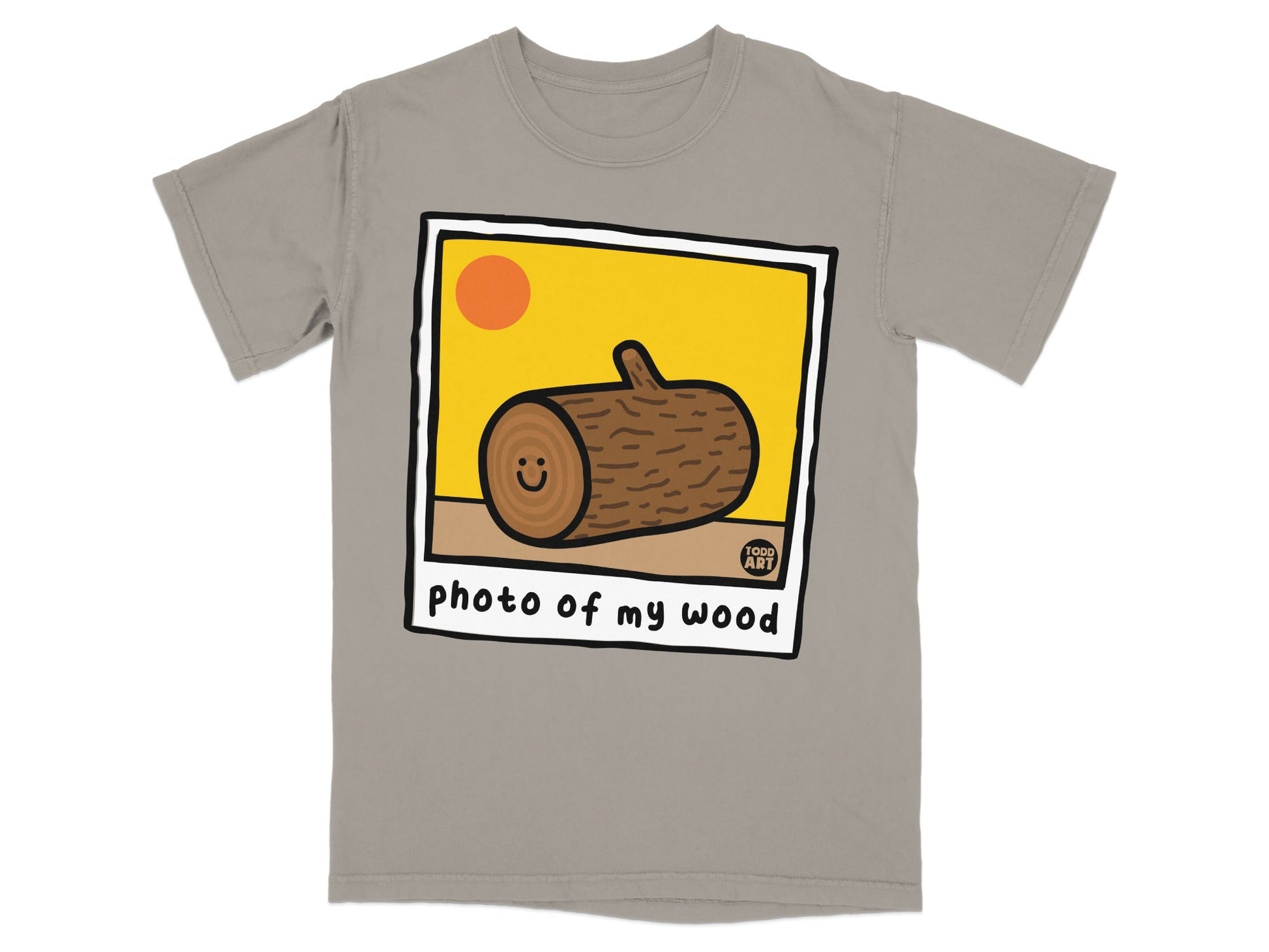 T-shirt featuring a cartoon log with a smiling face and text "photo of my wood".
