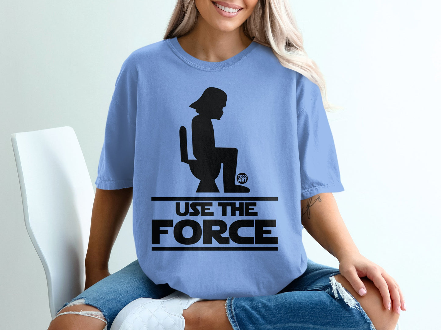 Blue t-shirt with Darth Vader silhouette on toilet, "Use the Force" text.