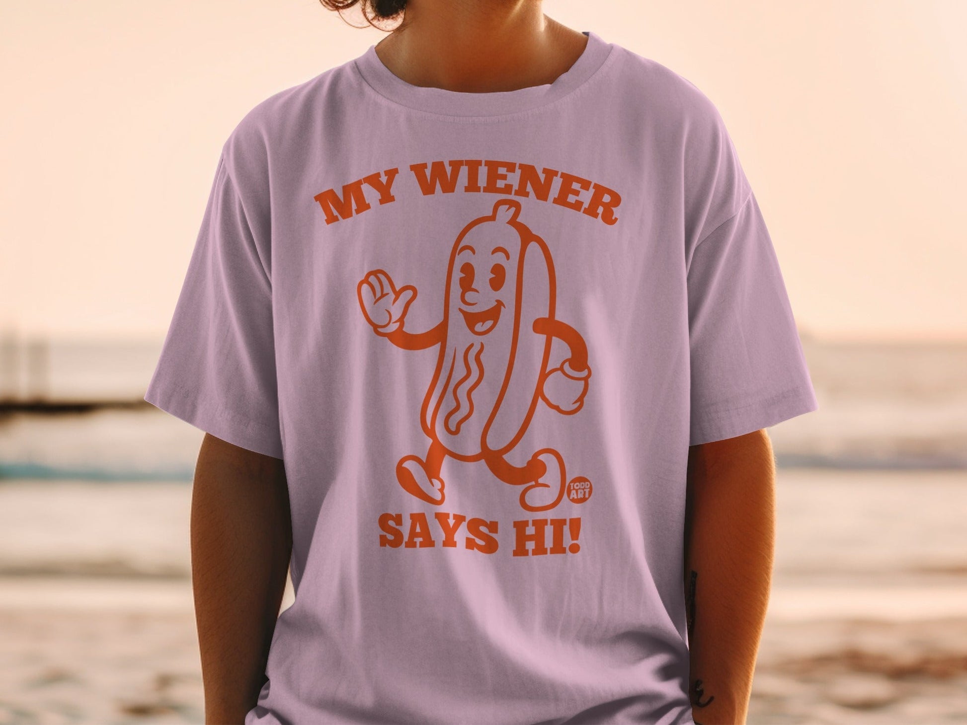 T-shirt with a cartoon hot dog saying "My Wiener Says Hi!"