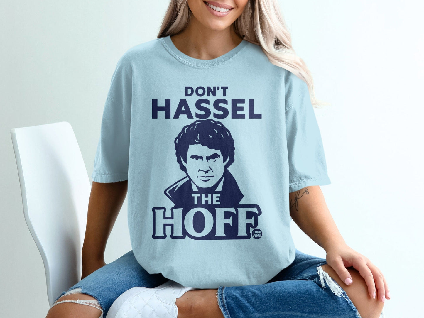 Light blue t-shirt with a portrait of David Hasselhoff and the text "DON'T HASSEL THE HOFF".