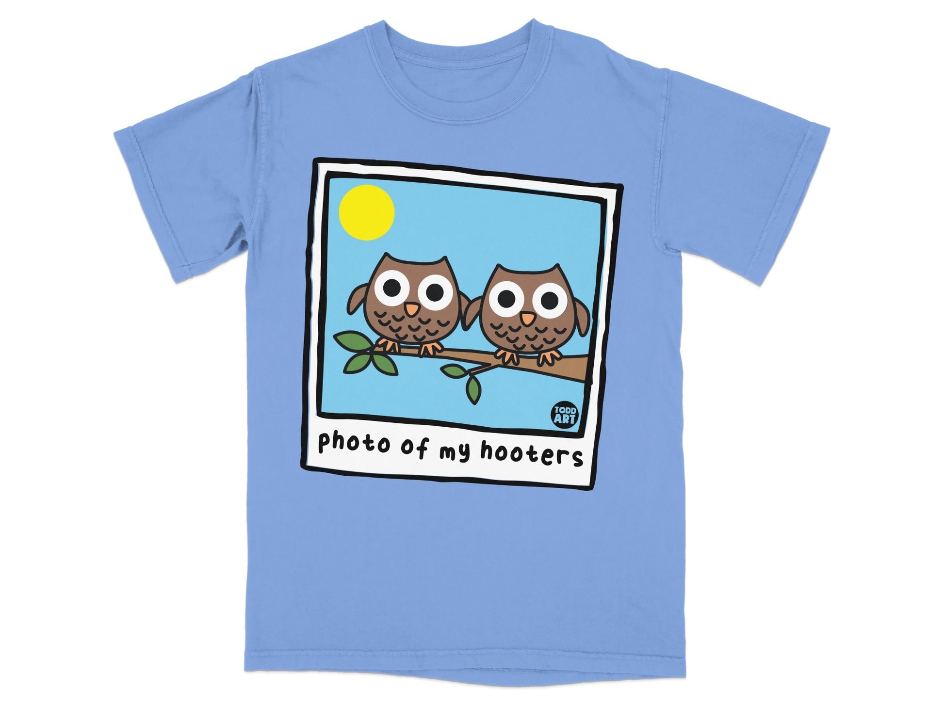 Two cartoon owls on a branch inside a polaroid frame with text.