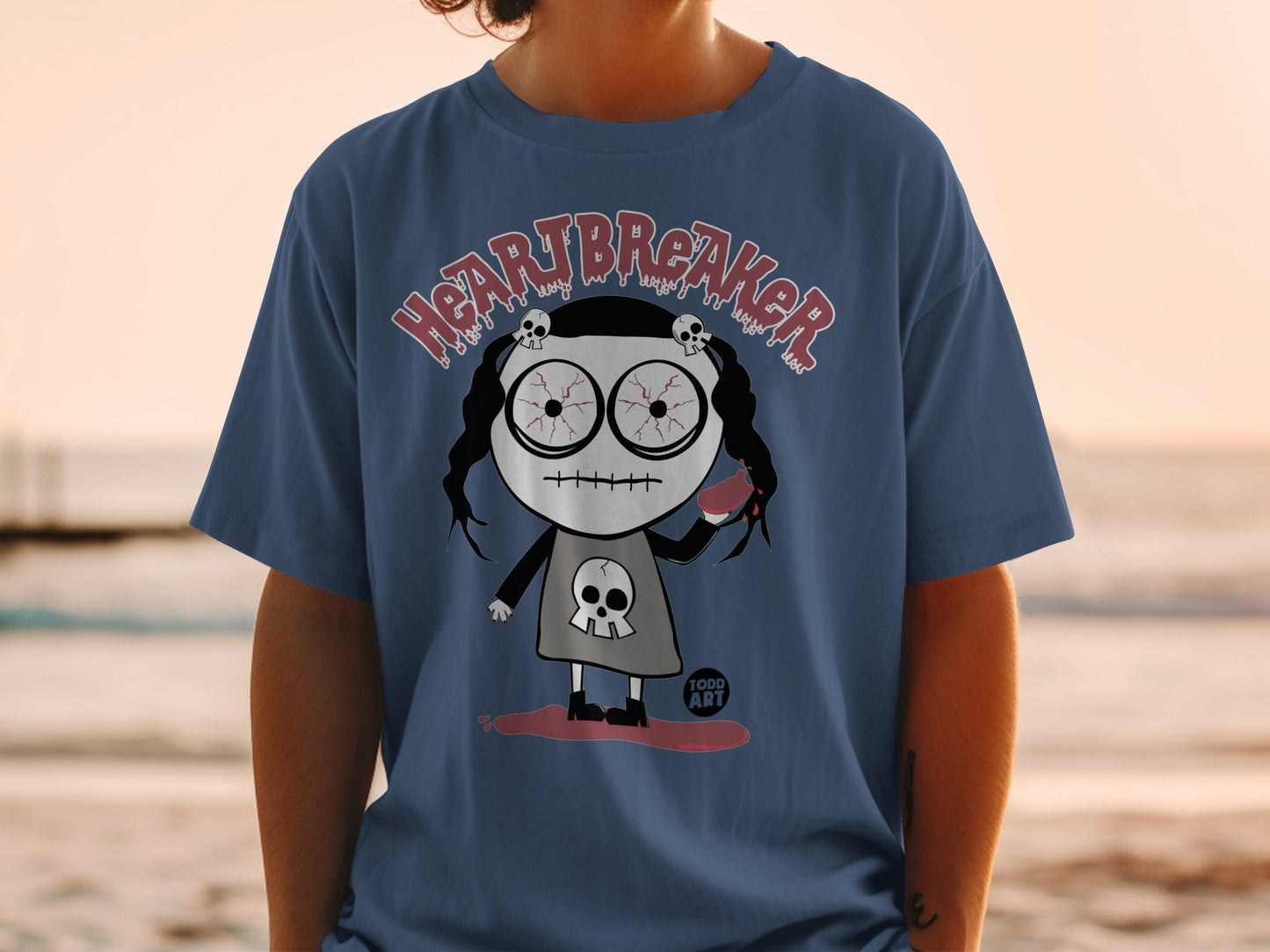 Heartbreaker Graphic Tee with Dark Cartoon Design